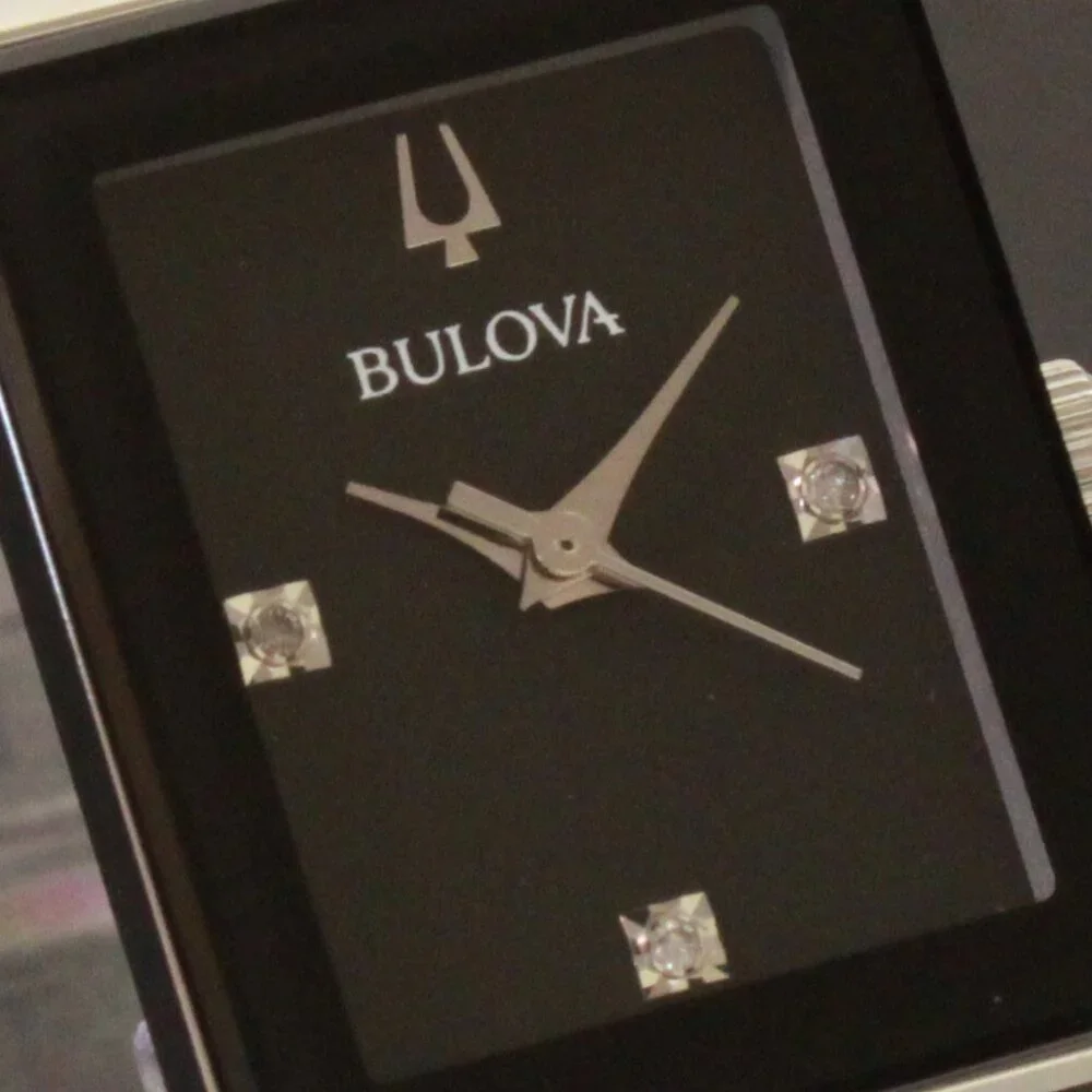 Bulova Ladies Quadra Watch Diamond Indices Black Dial Stainless 20mm